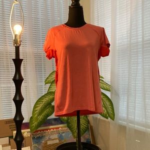 2 women athletic t-shirts